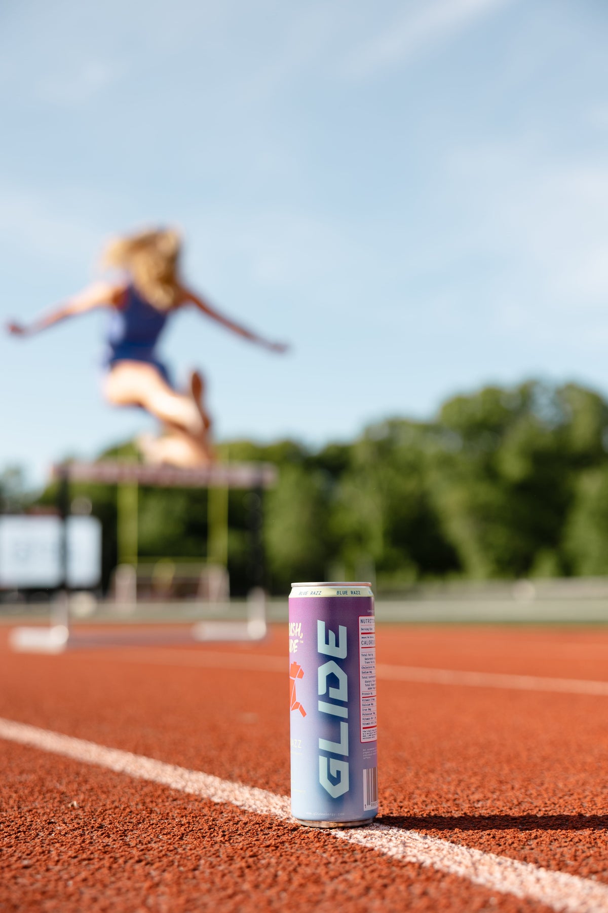 Glide Energy Blue Razz cans chilled on ice